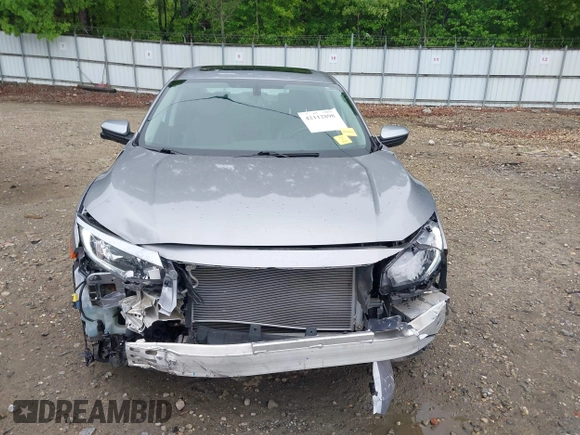 2017 Honda Civic EX-L z VIN 19XFC1F77HE026030, wystawiony jako IAAI lot #42112898 z przebiegiem 73 793 mil mil oraz . Historia ofert i sprzedaży dostępna na DreamBid. Obrazek 13.