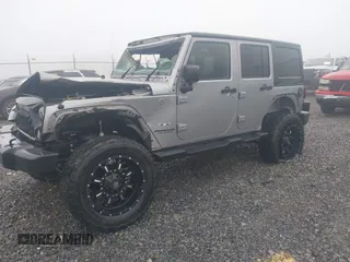 2016 Jeep Wrangler Unlimited 75th Anniversary with VIN 1C4BJWEG6GL170760, listed as a IAAI auction lot 41953745 with 72,827 mi miles and . Bid and sale history available at DreamBid. Image 2.