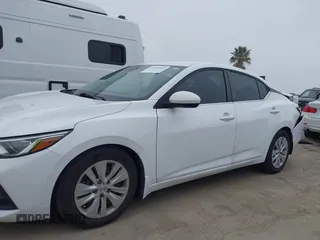 2020 Nissan Sentra S z VIN 3N1AB8BV1LY251208, wystawiony jako IAAI lot #42030362 z przebiegiem 55 257 mil mil oraz . Historia ofert i sprzedaży dostępna na DreamBid. Obrazek 14.
