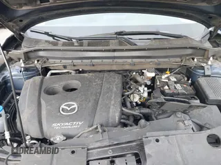 2019 Mazda CX-5 Touring with VIN JM3KFACM5K0697137, listed as a IAAI auction lot 41720253 with 50,416 mi miles. Bid and sale history available at carsss.com. Image 10.