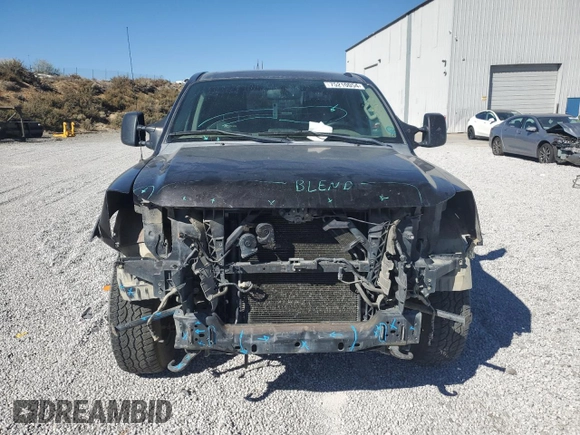 2014 Nissan Titan S with VIN 1N6AA0EC1EN510658, listed as a Copart auction lot 75210054 with Not Provided miles and Salvage Title. Bid and sale history available at DreamBid. Image 5.