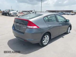 2010 Honda Insight EX with VIN JHMZE2H74AS040110, listed as a IAAI auction lot 42643669 with 189,531 mi miles and . Bid and sale history available at DreamBid. Image 4.