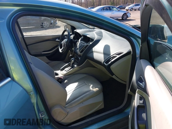 2012 Ford Focus SEL with VIN 1FAHP3H25CL172958, listed as a IAAI auction lot 41961889 with 135,052 mi miles. Bid and sale history available at carsss.com. Image 5.