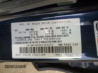 2016 Mazda 3 S Grand Touring z VIN JM1BM1N39G1355274, wystawiony jako Copart lot #44860435 z przebiegiem 151 993 mil mil oraz Szkoda całkowita • Salvage title. Historia ofert i sprzedaży dostępna na DreamBid. Obrazek 12.