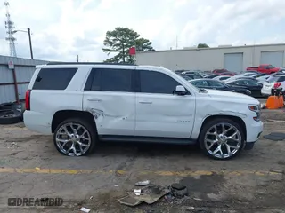 2019 Chevrolet Tahoe LT with VIN 1GNSCBKC6KR345154, listed as a IAAI auction lot 41808536 with 124,325 mi miles. Bid and sale history available at carsss.com. Image 13.