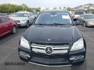 2011 Mercedes-Benz GL-Class GL 450 with VIN 4JGBF7BE1BA752615, listed as a IAAI auction lot 41075508 with 165,605 mi miles. Bid and sale history available at carsss.com. Image 6.