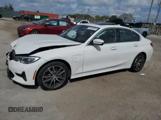2021 BMW 3 Series 330e with VIN 3MW5P7J06M8B79131, listed as a Copart auction lot 44978695 with 42,388 mi miles and Salvage Title. Bid and sale history available at carsss.com. Image 1.