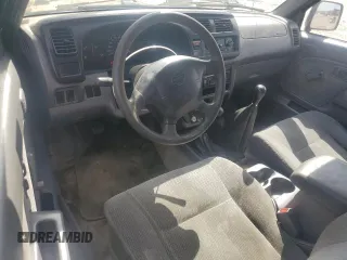 1999 Nissan Frontier XE z VIN 1N6ED26Y2XC301913, wystawiony jako Copart lot #53152165 z przebiegiem 271 272 mil mil oraz Szkoda całkowita • Salvage title. Historia ofert i sprzedaży dostępna na DreamBid. Obrazek 8.
