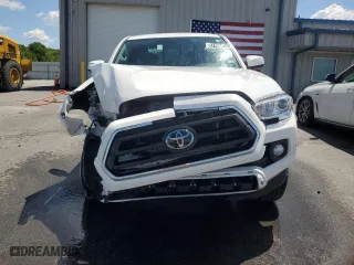 2023 Toyota Tacoma 2WD SR with VIN 3TYAX5GN0PT068597, listed as a Copart auction lot 57196314 with 31,998 mi miles and Clean Title. Bid and sale history available at carsss.com. Image 5.