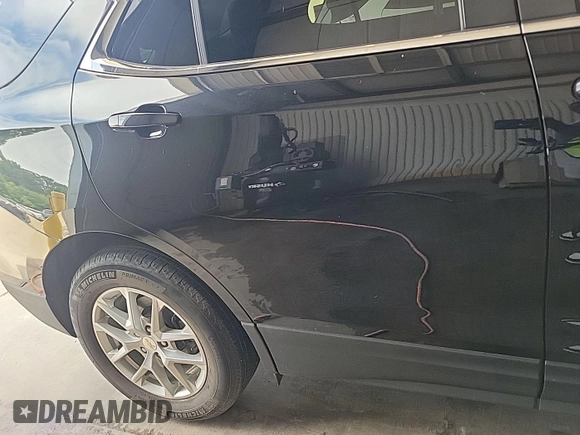 2022 Chevrolet Equinox LT z VIN 3GNAXJEV8NL130782, wystawiony jako IAAI lot #42521040 z przebiegiem 29 088 mil mil oraz . Historia ofert i sprzedaży dostępna na DreamBid. Obrazek 24.