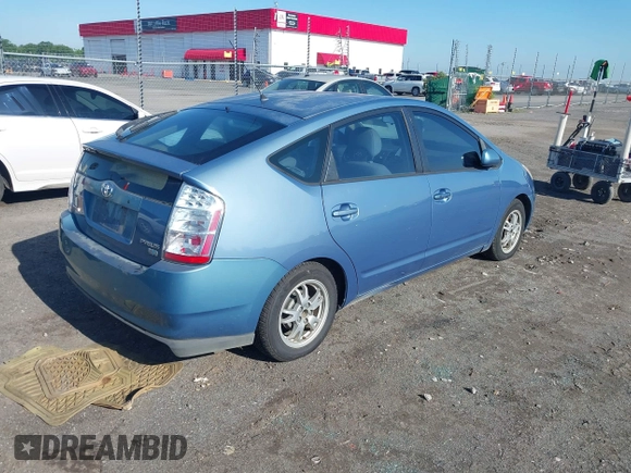 2004 Toyota Prius with VIN JTDKB20U340049006, listed as a IAAI auction lot 42230821 with 252,004 mi miles and . Bid and sale history available at DreamBid. Image 4.