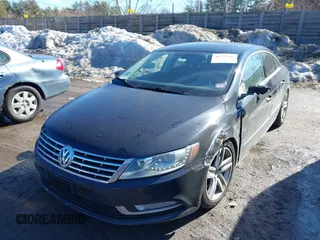 2013 Volkswagen CC Sport with VIN WVWBP7AN9DE565587, listed as a IAAI auction lot 41739505 with 167,319 mi miles. Bid and sale history available at carsss.com. Image 2.