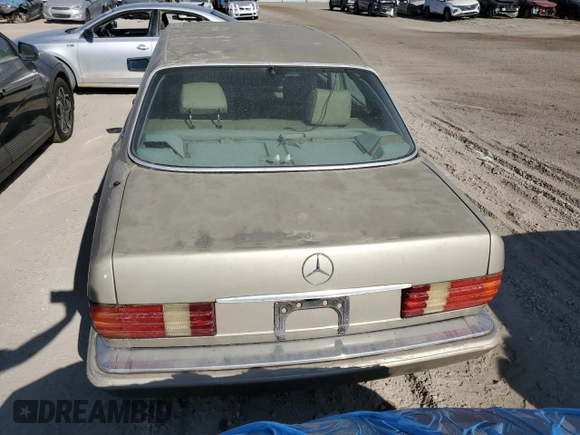 1989 Mercedes-Benz 560 with VIN WDBCA39E8KA469603, listed as a Copart auction lot 82986634 with 81,490 mi miles and Clean Title. Bid and sale history available at DreamBid. Image 6.