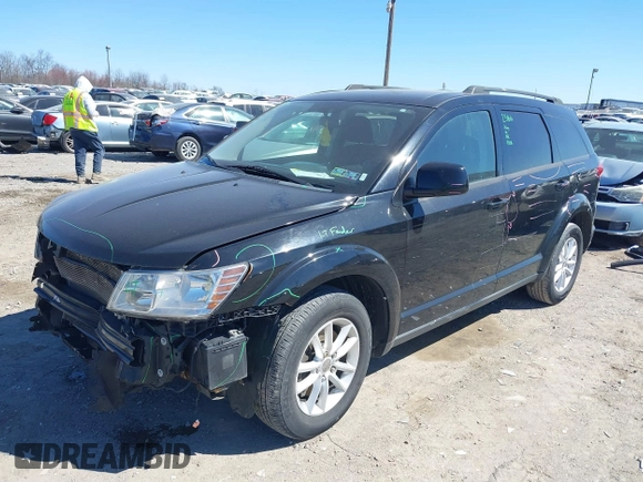 2016 Dodge Journey SXT with VIN 3C4PDCBGXGT123087, listed as a IAAI auction lot 41869667 with 256,583 mi miles. Bid and sale history available at carsss.com. Image 2.