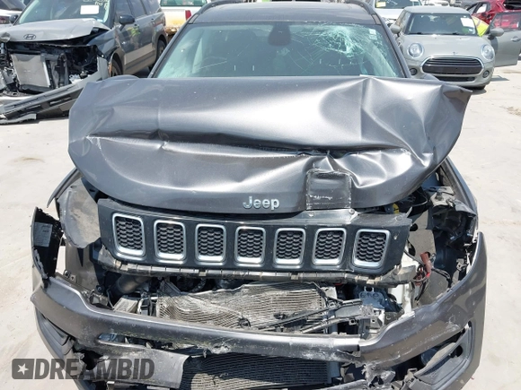 2021 Jeep Compass Latitude with VIN 3C4NJCBBXMT563858, listed as a IAAI auction lot 42327326 with Not provided miles and . Bid and sale history available at DreamBid. Image 13.