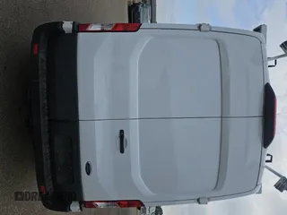 2023 Ford Transit Cargo with VIN 1FTBR1X86PKC02291, listed as a IAAI auction lot 42791621 with 32,389 mi miles and . Bid and sale history available at DreamBid. Image 1.