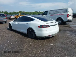 2014 Tesla Model S 60 with VIN 5YJSA1H1XEFP40611, listed as a IAAI auction lot 42826752 with Not provided miles and . Bid and sale history available at DreamBid. Image 3.