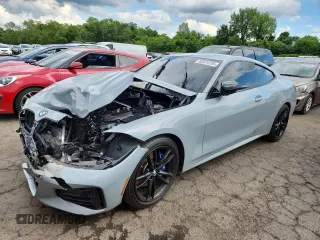 2022 BMW 4 Series M440i xDrive with VIN WBA13AR02NCJ20597, listed as a Copart auction lot 62574785 with Not provided miles and Salvage title. Bid and sale history available at DreamBid. Image 1.