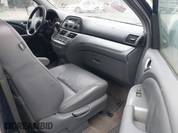 2005 Honda Odyssey EX-L with VIN 5FNRL38725B001662, listed as a IAAI auction lot 42693301 with 161,114 mi miles and . Bid and sale history available at DreamBid. Image 5.