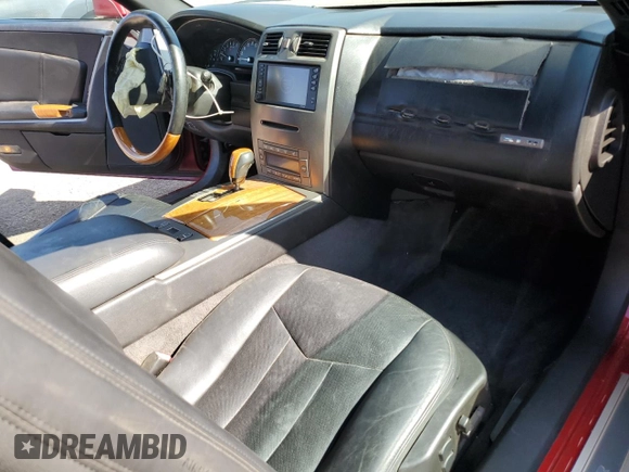 2004 Cadillac XLR z VIN 1G6YV34A345600127, wystawiony jako Copart lot #68859774 z przebiegiem 40 727 mil mil oraz Szkody całkowita. Historia ofert i sprzedaży dostępna na DreamBid. Obrazek 8.