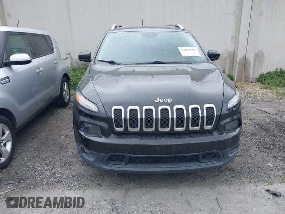 2015 Jeep Cherokee Latitude with VIN 1C4PJLCB9FW627909, listed as a IAAI auction lot 42034667 with 131,739 mi miles and . Bid and sale history available at carsss.com. Image 13.