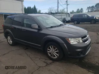 2015 Dodge Journey SXT with VIN 3C4PDDBG1FT725882, listed as a Copart auction lot 55903755 with 111,941 mi miles and Salvage title. Bid and sale history available at DreamBid. Image 4.