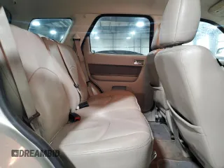 2010 Mercury Mariner Premier with VIN 4M2CN9H74AKJ06777, listed as a Copart auction lot 87920815 with 187,208 mi miles and Salvage title. Bid and sale history available at DreamBid. Image 11.