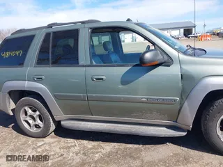 2004 Chevrolet TrailBlazer LS with VIN 1GNDT13S142119527, listed as a IAAI auction lot 41814047 with 210,762 mi miles. Bid and sale history available at carsss.com. Image 14.