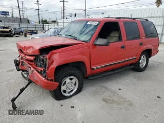 2000 Chevrolet Tahoe Z71 with VIN 1GNEK13R6YR215140, listed as a Copart auction lot 84868964 with 172,958 mi miles and Salvage title. Bid and sale history available at DreamBid. Image 1.