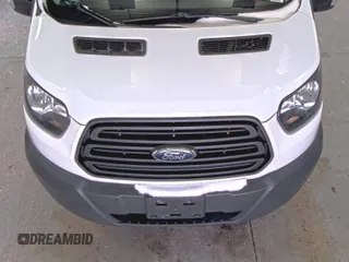 2018 Ford Transit z VIN 1FTYR1YG6JKA87506, wystawiony jako IAAI lot #42501070 z przebiegiem 167 892 mil mil oraz . Historia ofert i sprzedaży dostępna na DreamBid. Obrazek 29.