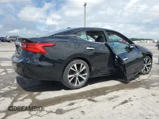 2017 Nissan Maxima SL with VIN 1N4AA6AP4HC424958, listed as a Copart auction lot 57298725 with 127,485 mi miles and Salvage title. Bid and sale history available at DreamBid. Image 3.