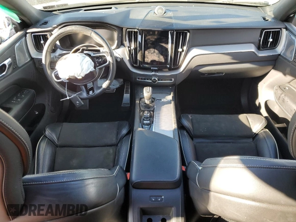 2019 Volvo XC60 R-Design z VIN LYVA22RM8KB230942, wystawiony jako Copart lot #81098054 z przebiegiem Nie podano mil oraz Szkoda całkowita • Salvage title. Historia ofert i sprzedaży dostępna na DreamBid. Obrazek 8.