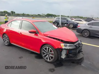 2013 Volkswagen Jetta GLI Autobahn z VIN 3VW567AJ7DM405874, wystawiony jako IAAI lot #42411711 z przebiegiem 112 817 mil mil oraz . Historia ofert i sprzedaży dostępna na DreamBid. Obrazek 1.