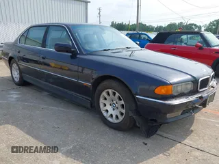 2000 BMW 7 Series 740iL z VIN WBAGH8340YDP17276, wystawiony jako IAAI lot #42409461 z przebiegiem 185 220 mil mil oraz . Historia ofert i sprzedaży dostępna na DreamBid. Obrazek 1.