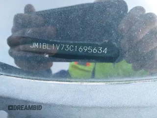 2012 Mazda 3 i Touring z VIN JM1BL1V73C1695634, wystawiony jako IAAI lot #42223477 z przebiegiem 138 302 mil mil oraz . Historia ofert i sprzedaży dostępna na DreamBid. Obrazek 9.