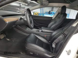 2021 Tesla Model 3 Standard Range Plus z VIN 5YJ3E1EA4MF943036, wystawiony jako Copart lot #54008355 z przebiegiem 62 981 mil mil oraz Szkoda całkowita • Salvage title. Historia ofert i sprzedaży dostępna na DreamBid. Obrazek 7.