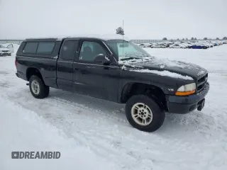2000 Dodge Dakota SLT with VIN 1B7GG22X1YS504086, listed as a Copart auction lot 44283195 with 137,272 mi miles and Clean Title. Bid and sale history available at DreamBid. Image 4.