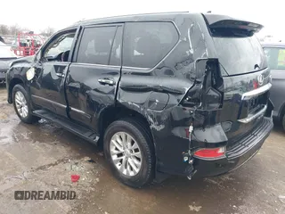 2014 Lexus GX 460 with VIN JTJBM7FX6E5073973, listed as a IAAI auction lot 41610332 with 128,870 mi miles. Bid and sale history available at carsss.com. Image 3.