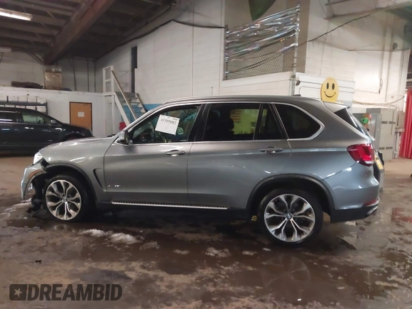 2018 BMW X5 xDrive35i with VIN 5UXKR0C53J0Y03214, listed as a IAAI auction lot 41509082 with 92,552 mi miles. Bid and sale history available at carsss.com. Image 14.