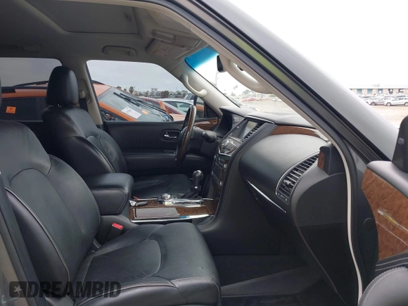 2015 Infiniti QX80 with VIN JN8AZ2NE9F9086475, listed as a IAAI auction lot 42783811 with 114,053 mi miles and . Bid and sale history available at DreamBid. Image 5.