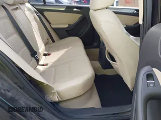 2015 Volkswagen Jetta SE with VIN 3VWD07AJ7FM306911, listed as a IAAI auction lot 42173985 with 143,111 mi miles and . Bid and sale history available at DreamBid. Image 8.