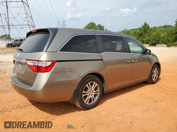 2013 Honda Odyssey EX-L with VIN 5FNRL5H68DB075153, listed as a Copart auction lot 60887325 with 263,001 mi miles and Salvage title. Bid and sale history available at DreamBid. Image 3.
