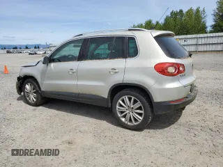 2011 Volkswagen Tiguan SEL z VIN WVGBV7AX6BW559854, wystawiony jako Copart lot #56268195 z przebiegiem 107 428 mil mil oraz Czysty tytuł • Clean title. Historia ofert i sprzedaży dostępna na DreamBid. Obrazek 2.