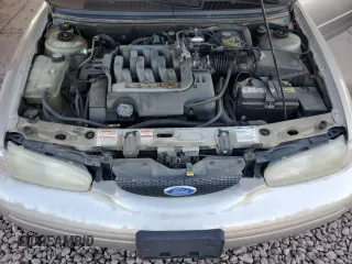1996 Ford Contour z VIN 1FALP65L3TK117309, wystawiony jako Copart lot #88454995 z przebiegiem 100 401 mil mil oraz Czysty tytuł • Clean title. Historia ofert i sprzedaży dostępna na DreamBid. Obrazek 11.