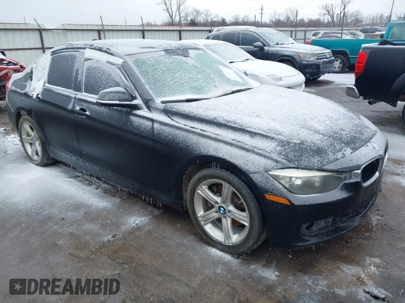 2012 BMW 3 Series 328i with VIN WBA3A5C56CF348558, listed as a IAAI auction lot 41541776 with 138,245 mi miles. Bid and sale history available at carsss.com. Image 1.