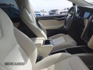 2018 Tesla Model X 75D with VIN 5YJXCDE21JF139712, listed as a IAAI auction lot 41905326 with Not Provided miles and . Bid and sale history available at carsss.com. Image 5.