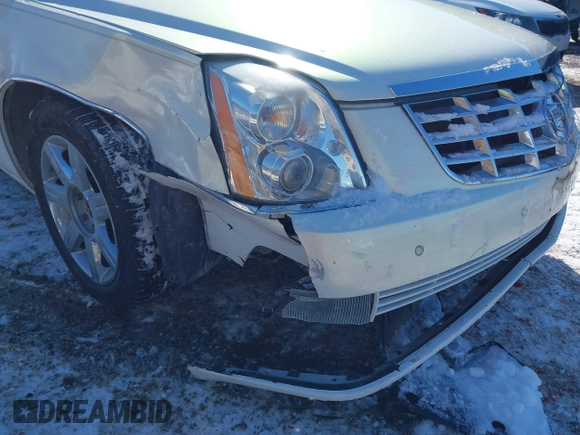 2006 Cadillac DTS 1SC z VIN 1G6KD57Y86U102513, wystawiony jako IAAI lot #41607409 z przebiegiem 102 438 mil mil oraz . Historia ofert i sprzedaży dostępna na DreamBid. Obrazek 6.