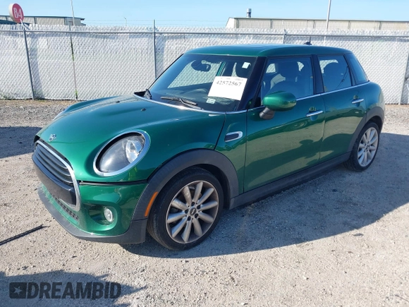 2020 MINI Hardtop 4 Door Cooper with VIN WMWXU7C06L2M63032, listed as a IAAI auction lot 42572567 with 86,220 mi miles and . Bid and sale history available at DreamBid. Image 17.
