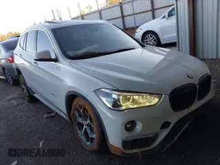 2018 BMW X1 xDrive28i with VIN WBXHT3C32J5K29627, listed as a IAAI auction lot 40995212 with 64,162 mi miles. Bid and sale history available at carsss.com. Image 1.