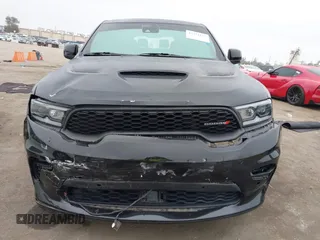 2021 Dodge Durango R/T with VIN 1C4SDHCT5MC660105, listed as a IAAI auction lot 42373172 with 75,227 mi miles and . Bid and sale history available at DreamBid. Image 12.